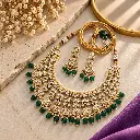 Luxurious Emerald Kundan Jewelry Flat Lay.webp
