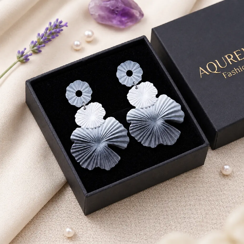 Elegant Ruffled Earrings in Luxury Flat Lay.webp