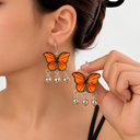 AURELIQ Vibrant Orange Butterfly Enamel Dangle Earrings